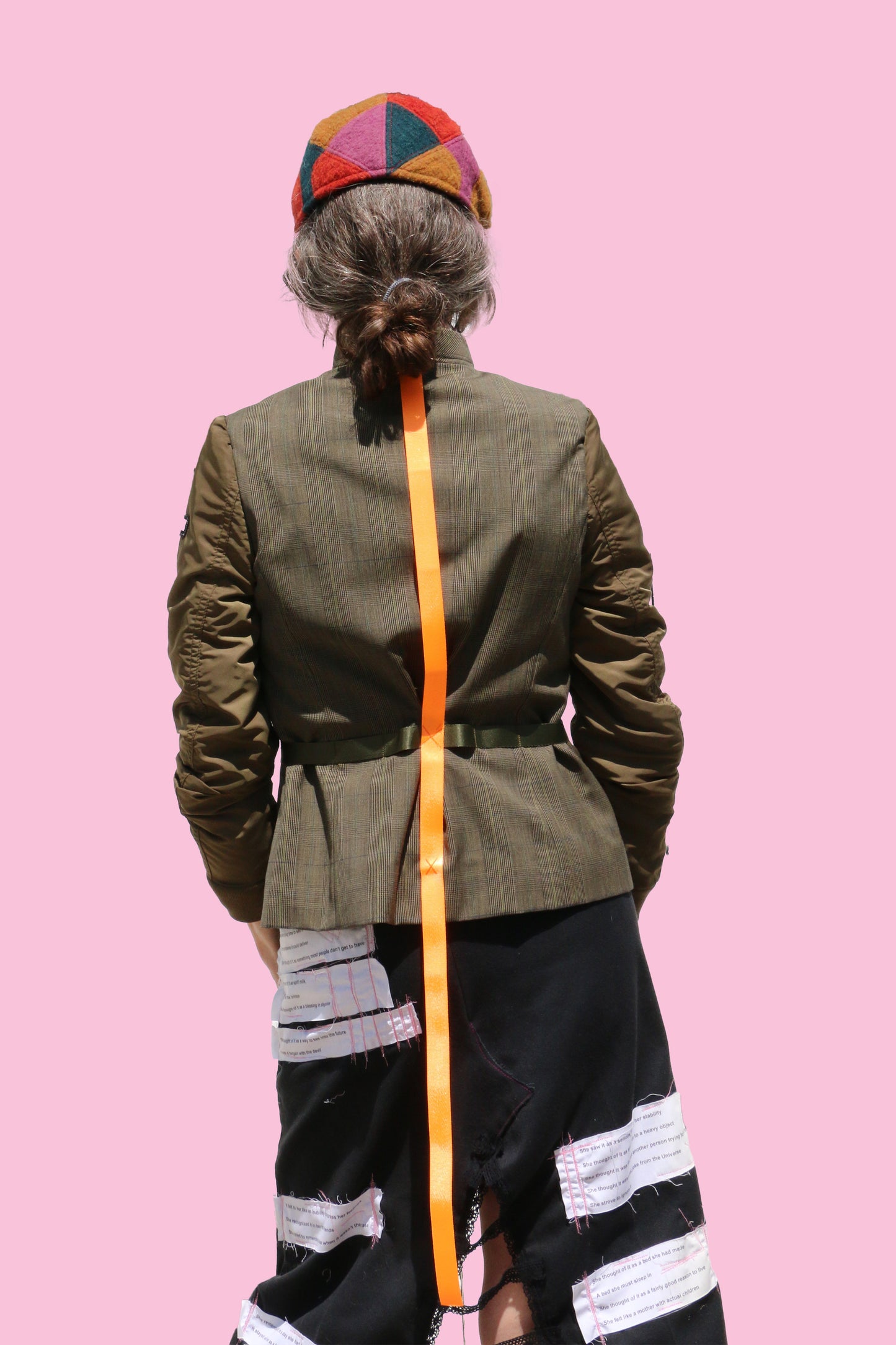 military jacket with orange strap