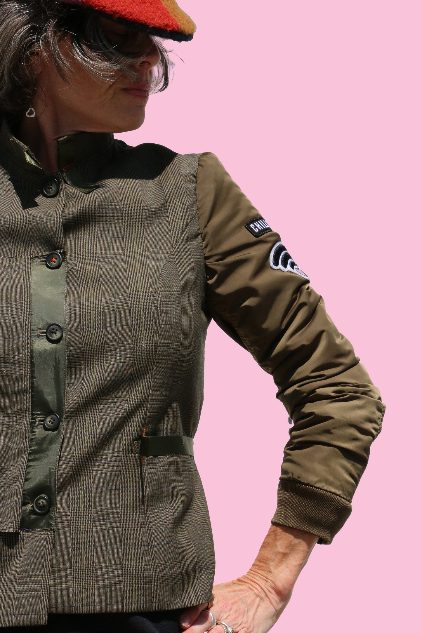 military jacket with orange strap